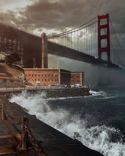 Fort Point historic building beneath the Golden Gate Bridge with crashing waves and stormy sky