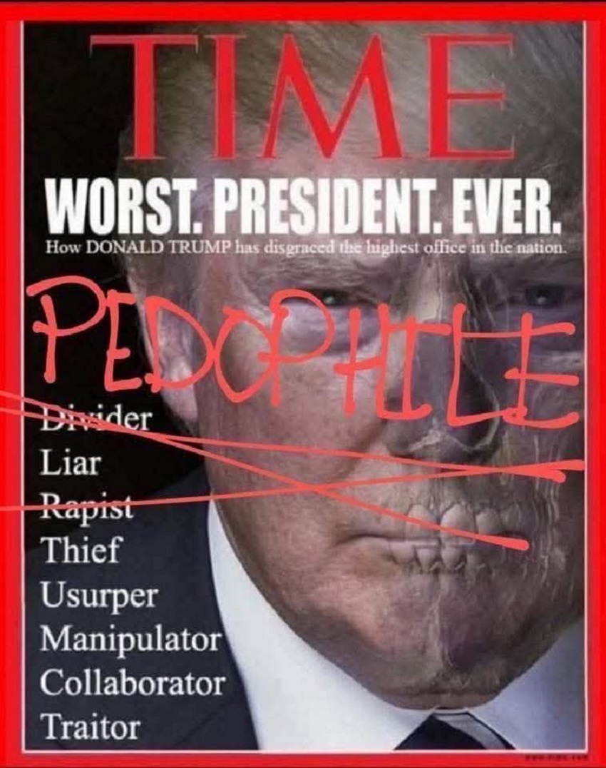 TIME magazine cover defaced with red graffiti writing and markings over portrait