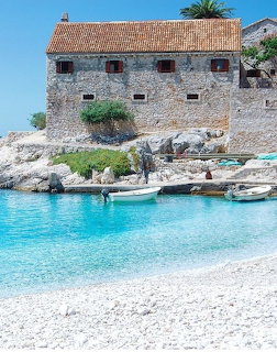 Stone House by Turquoise Sea