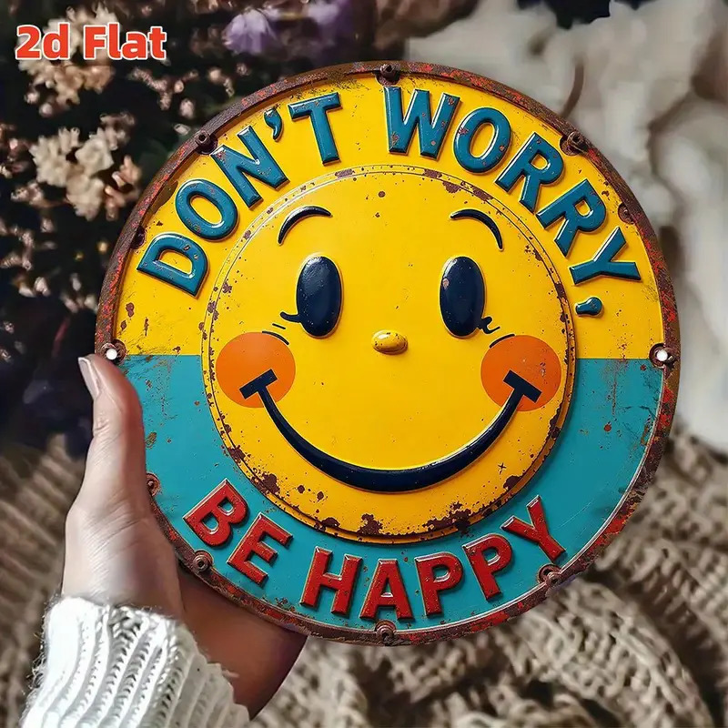 Round yellow vintage sign with smiley face and Don't Worry Be Happy text