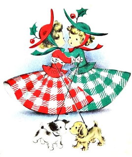 Two girls in red and green gingham dresses dancing with holly, accompanied by two small dogs