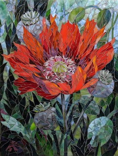 Mosaic art of a large red poppy flower with detailed petals and green foliage background