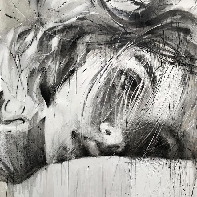 Black and white painted close-up portrait of a woman with tousled hair and closed eyes