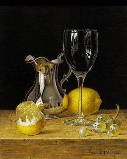 Still life painting with lemons, grapes, a silver pitcher, and a dark wine glass on a wooden table