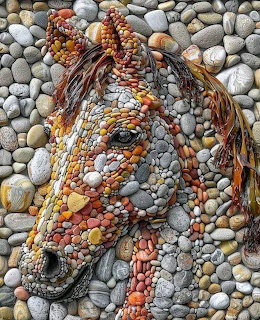 Horse head portrait made from arranged colorful pebbles and stones forming a mosaic artwork