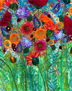 Colorful fabric quilt art showing red, orange, yellow and purple flowers with green stems in detailed needlework