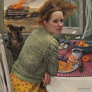 Woman in green sweater seated at kitchen table with black dog and burning hay bales visible through window