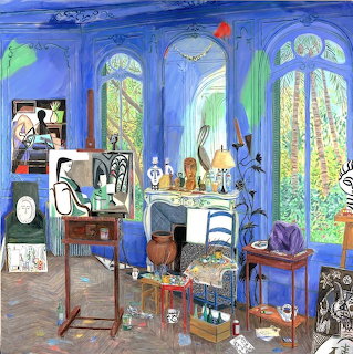 Vibrant painted interior of Picasso's studio with blue walls, tall windows, easels, and art supplies