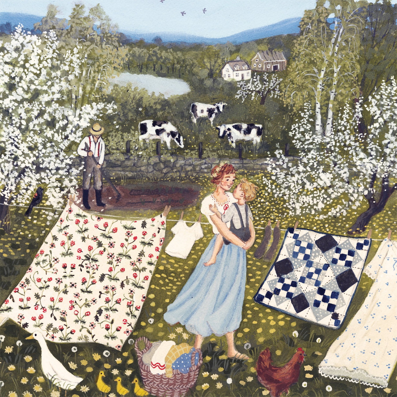 Woman in long dress hanging patterned quilts on clothesline in countryside with cows and flowering trees