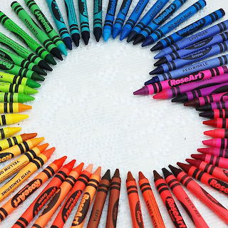 Colorful Crayons in Rainbow Circle