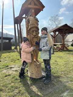 Children With Wooden Sculpture