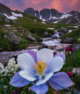 Colorado mountain landscape with peaks and evergreen forest