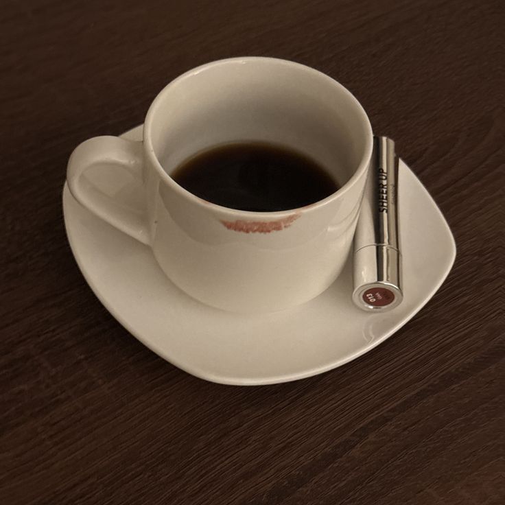 White Coffee Cup on Saucer