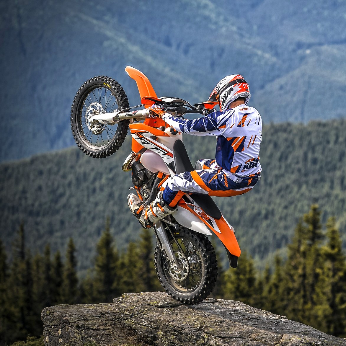 Motocross Rider Mountain Wheelie