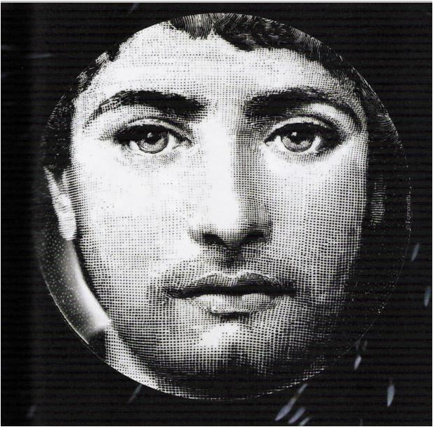 Black-and-white artistic portrait of a man's face inside a circular frame