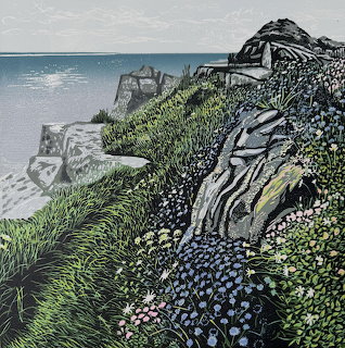 Painting of a grassy coastal cliff with rocks, wildflowers, and calm sea