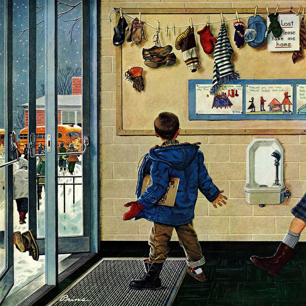 Boy in blue jacket viewing bulletin board with mittens in school hallway, snow outside glass doors