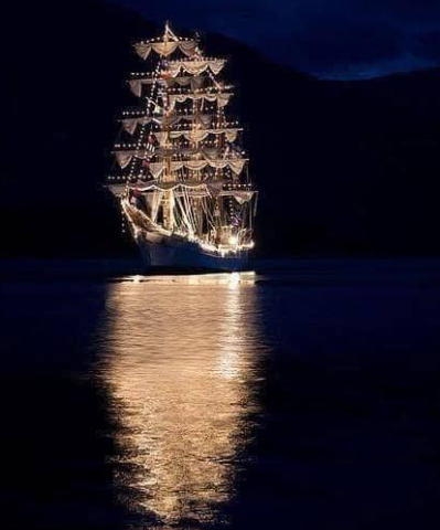 Illuminated Tall Ship at Night