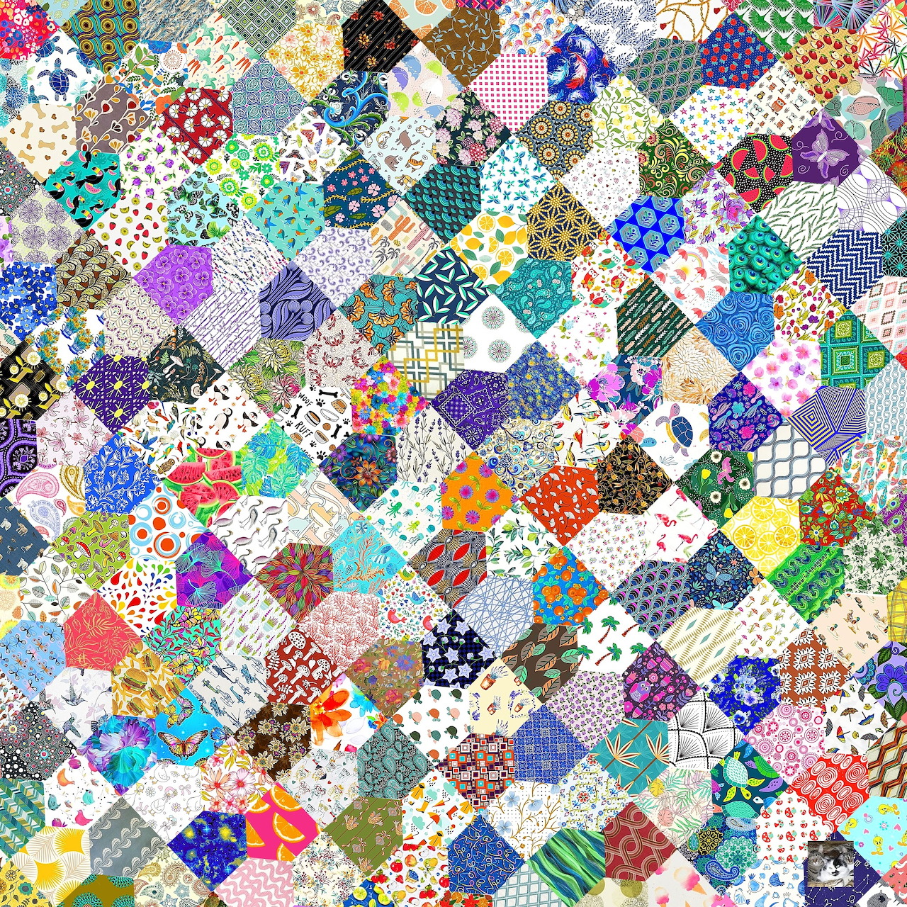 Colorful hexagonal patchwork quilt with various fabric patterns and textures
