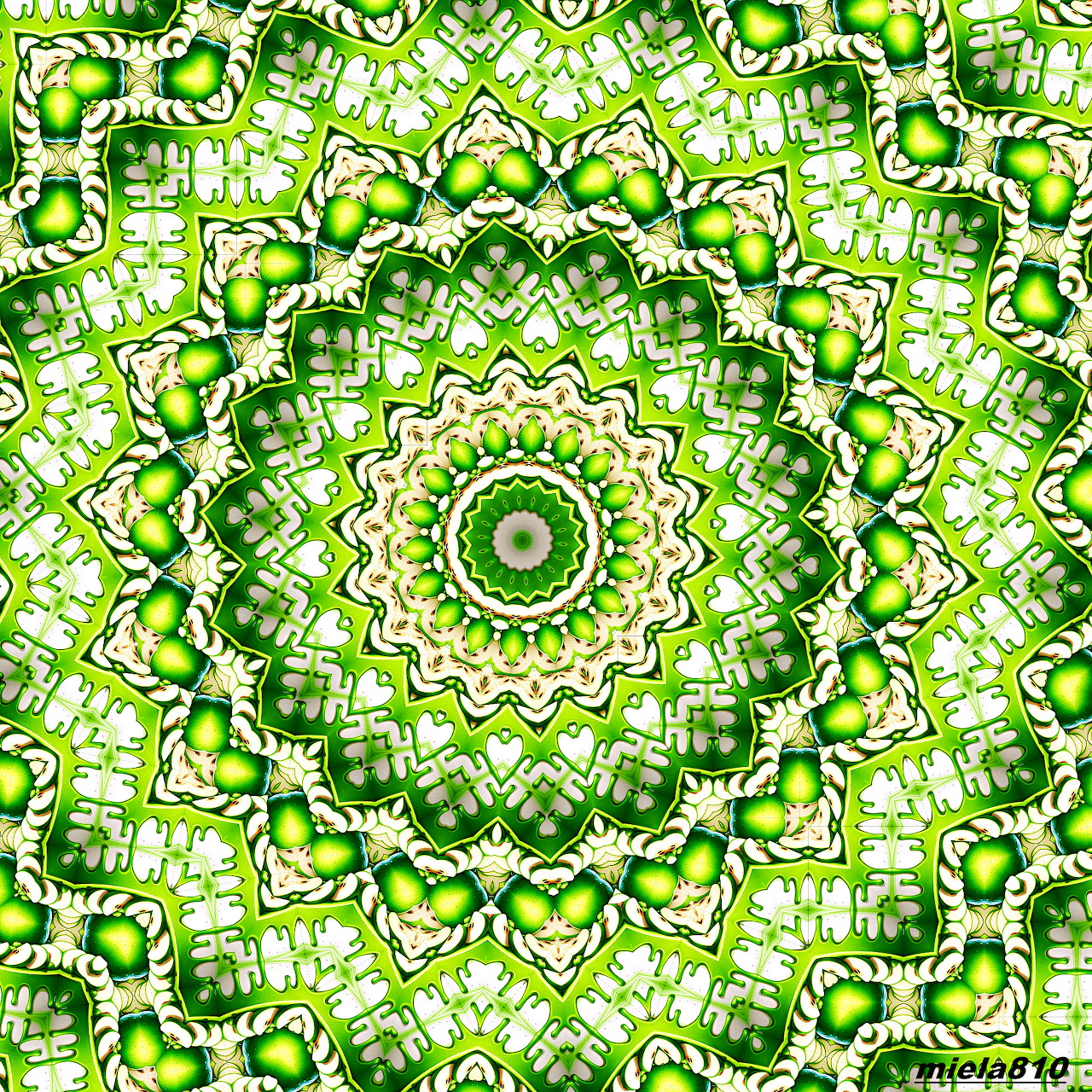 Symmetrical green and yellow mandala with intricate geometric patterns radiating from a central circle
