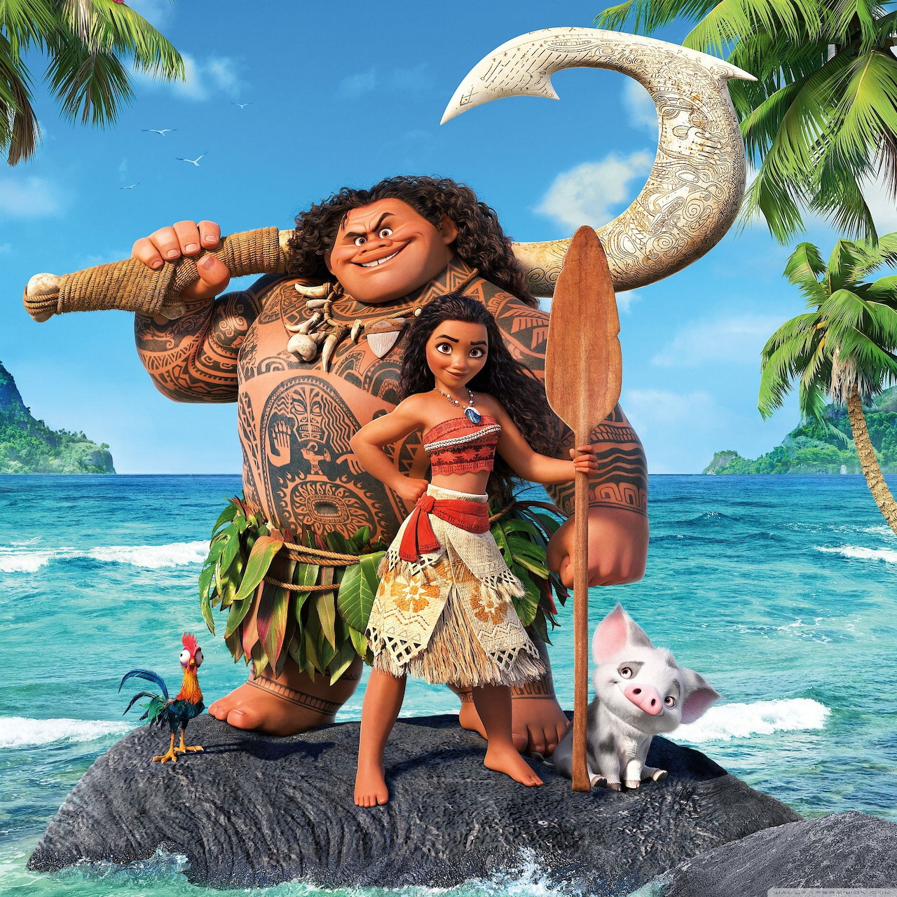 Moana and Maui characters standing on rock with ocean and palm trees behind them