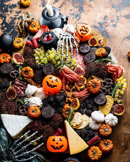 Halloween tray with assorted candies and spooky themed sweets