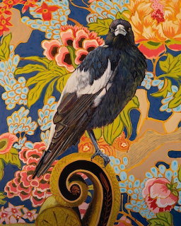 Decorative floral illustration of a black-and-white magpie perched on a curling branch