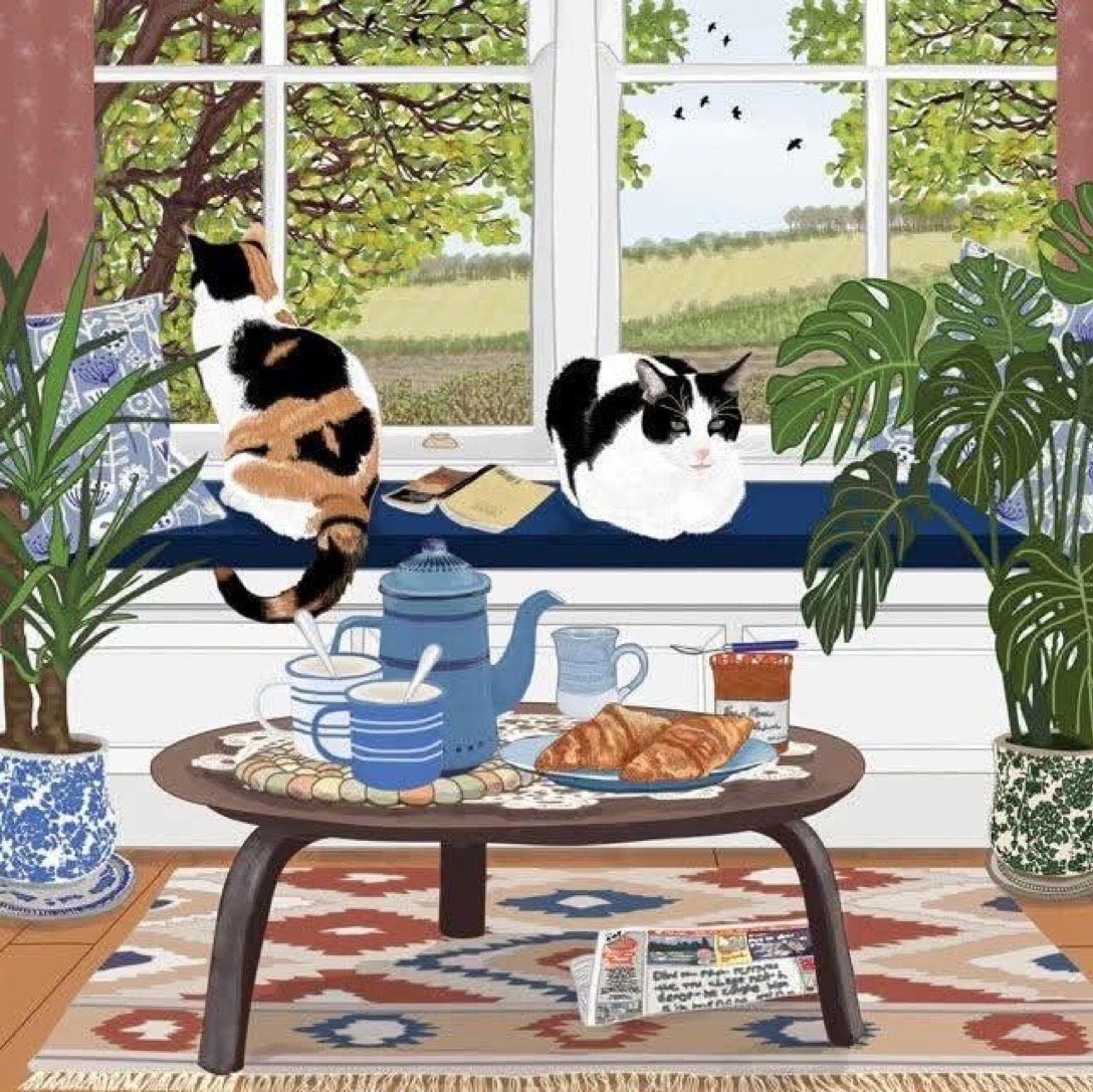 Two cats sitting on windowsill with plants, tea table with pastries in foreground, countryside view through window