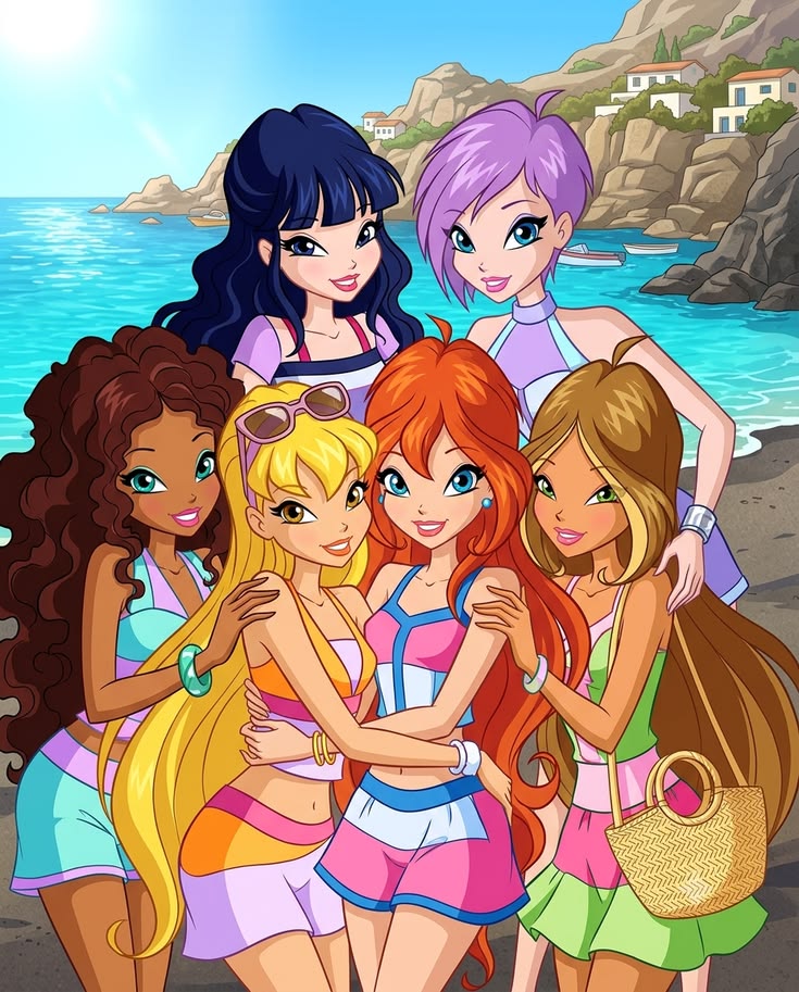 Five animated Winx girls posing together on a beach with ocean and rocky cliffs