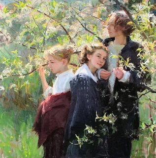 Three women in period clothing among blooming spring branches with dappled sunlight