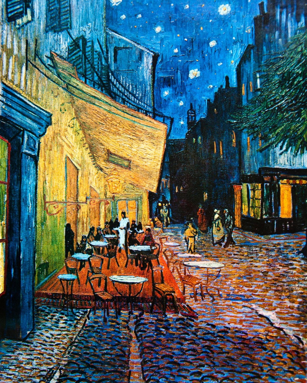 Van Gogh painting of a café terrace at night with yellow lighting, cobblestone street, and stary blue sky