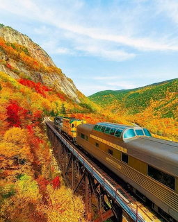 Autumn Train Through Mountains