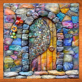 Colorful mosaic house made of painted stones with arched doorway and decorative tiles