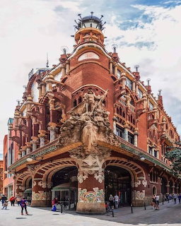 Ornate Art Nouveau facade of Palau de la Música Catalana in Barcelona with sculptures and mosaics