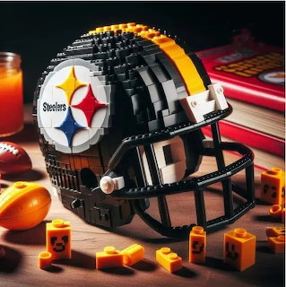 Black and yellow Steelers football helmet made of toy building blocks on a table