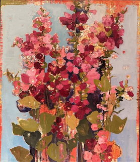 Abstract painting of red and pink flowers with loose brushstrokes on light blue background
