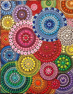 Abstract dot painting with colorful circular mandala patterns in rainbow colors