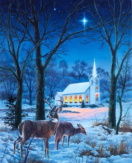 Illuminated white chapel in snow with two deer under starry winter night sky