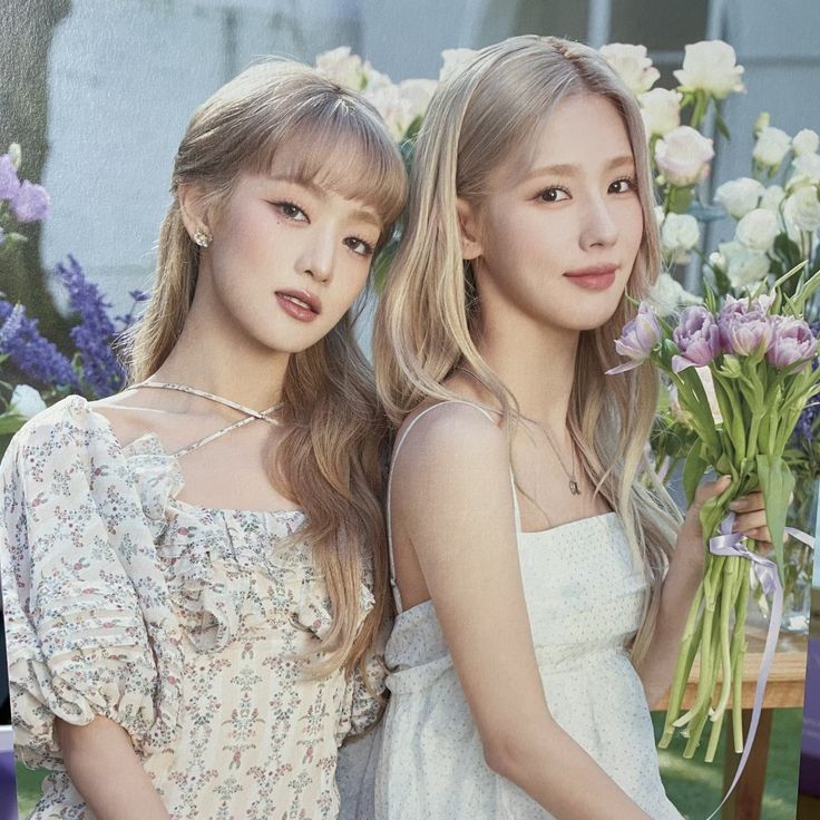 Two Women in Elegant Dresses