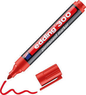 Red permanent marker with cap off and red ink line drawn on white background