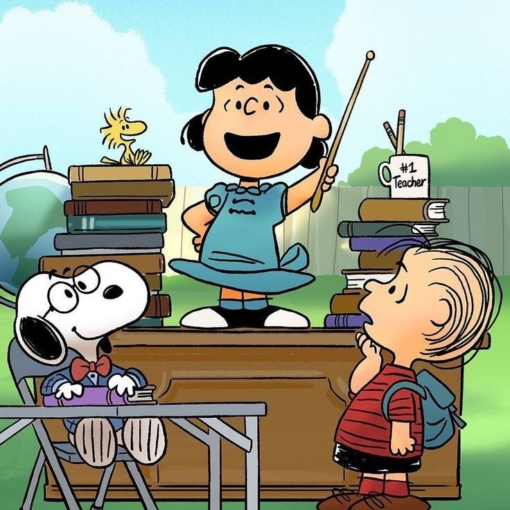 Cartoon scene of Lucy, Snoopy, and Charlie Brown with books and school supplies outdoors