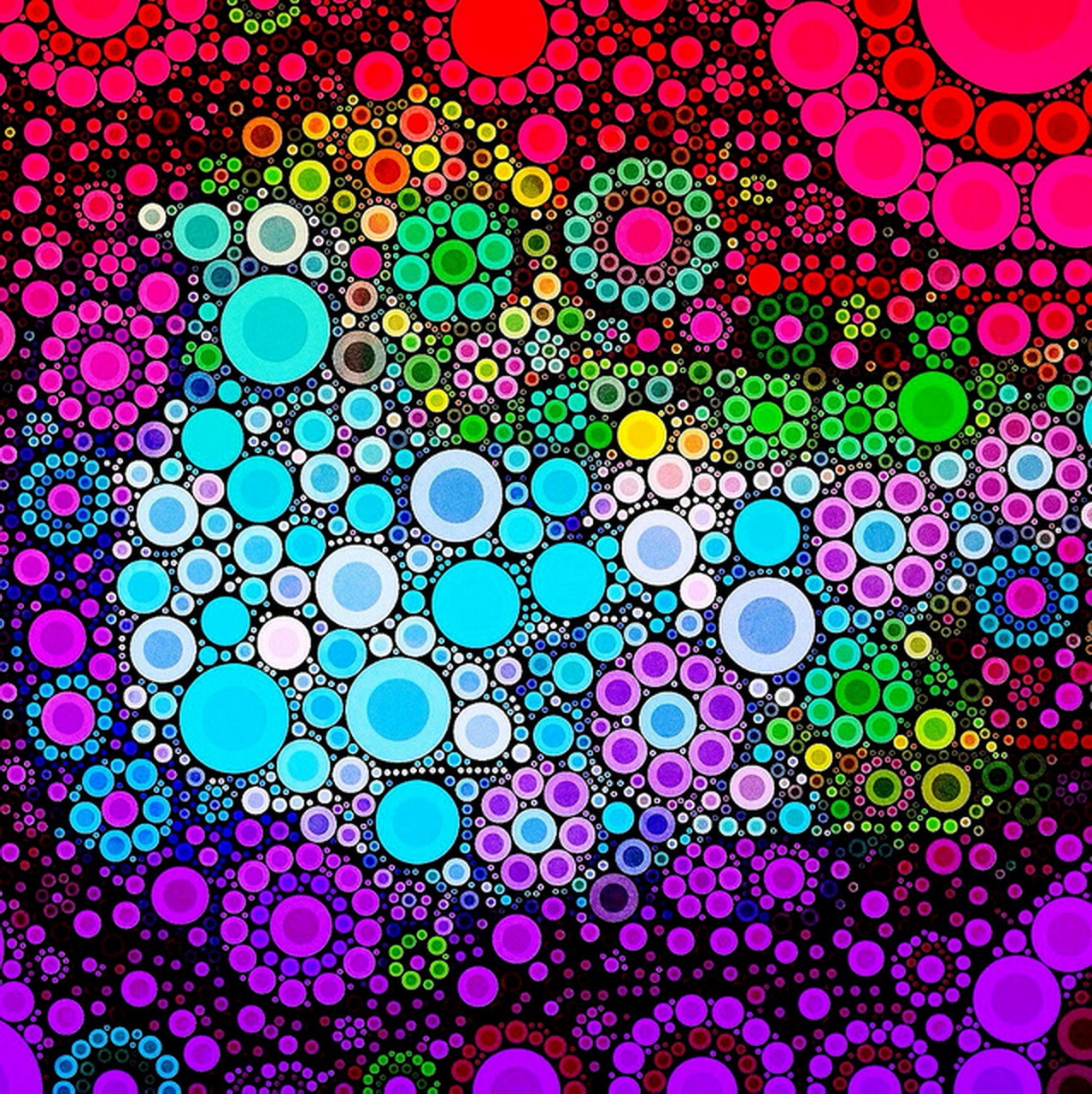 Abstract pattern of overlapping colorful circles and dots in pink, blue, green, purple, and yellow on black background