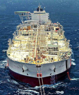 Aerial view of FSO Asia floating storage vessel at sea with complex deck ping and equipment