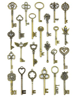 Ornate antique skeleton keys arranged on a white background