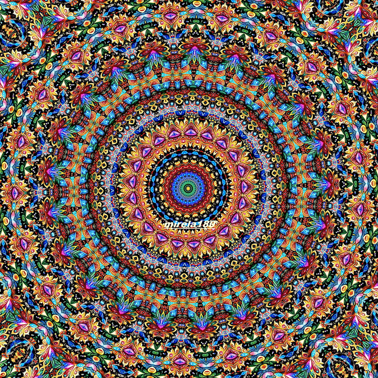 Vibrant circular mandala with intricate floral patterns in rainbow colors on dark background