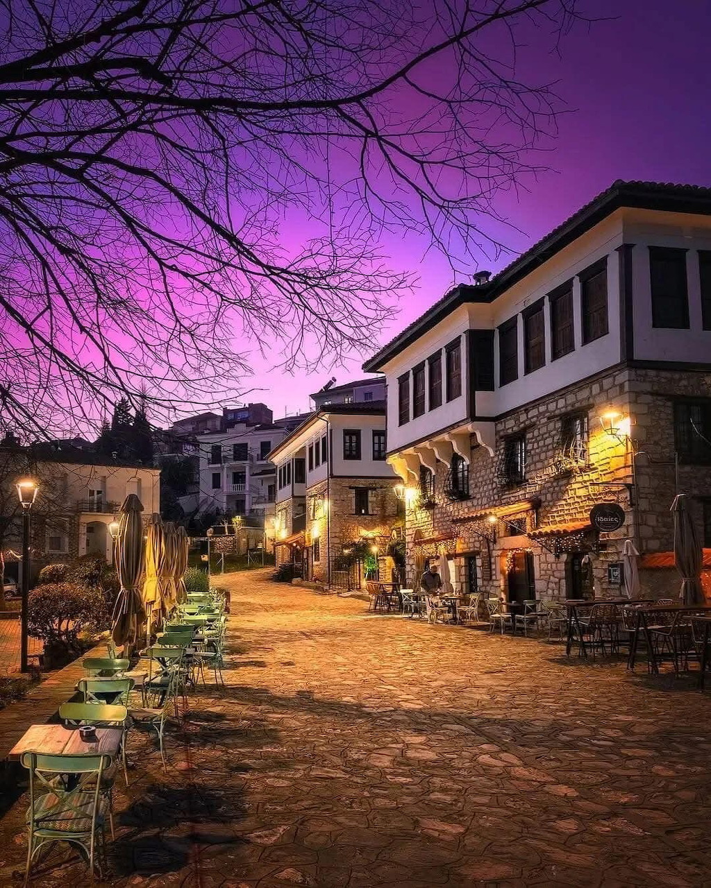 Kastoria town in Greece at sunset reflected on the lake