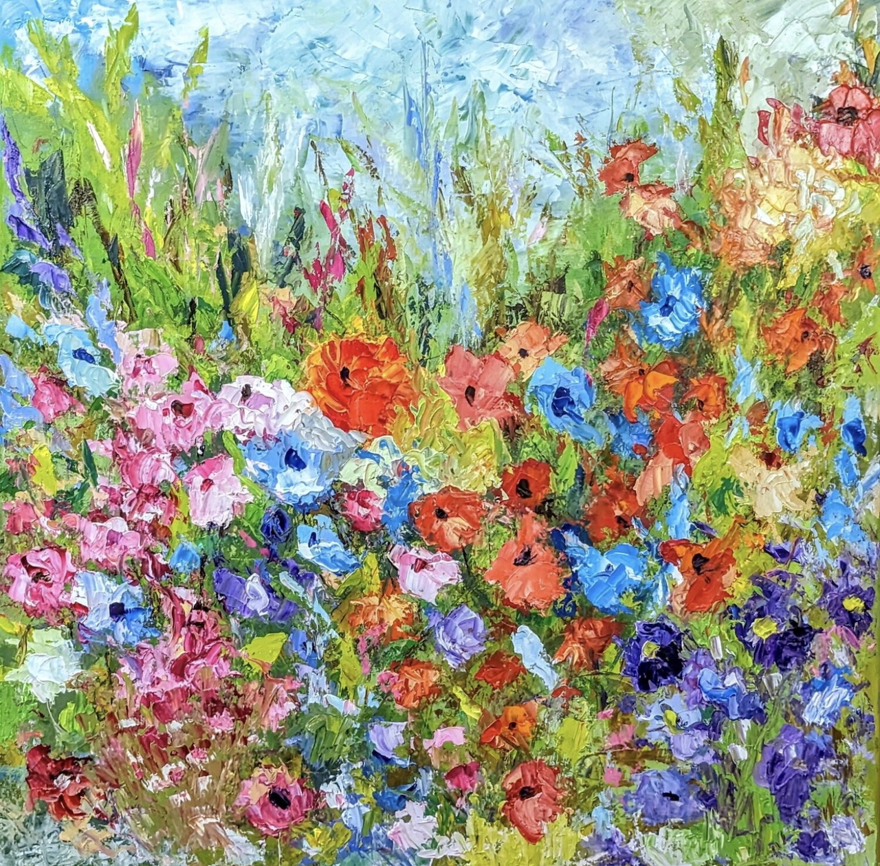 Impressionist painting showing colorful wildflowers in red, pink, blue, and orange with green stems and leaves