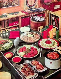 Vintage photo of a retro party food buffet spread with cold cuts, deviled eggs, meatballs, and salads
