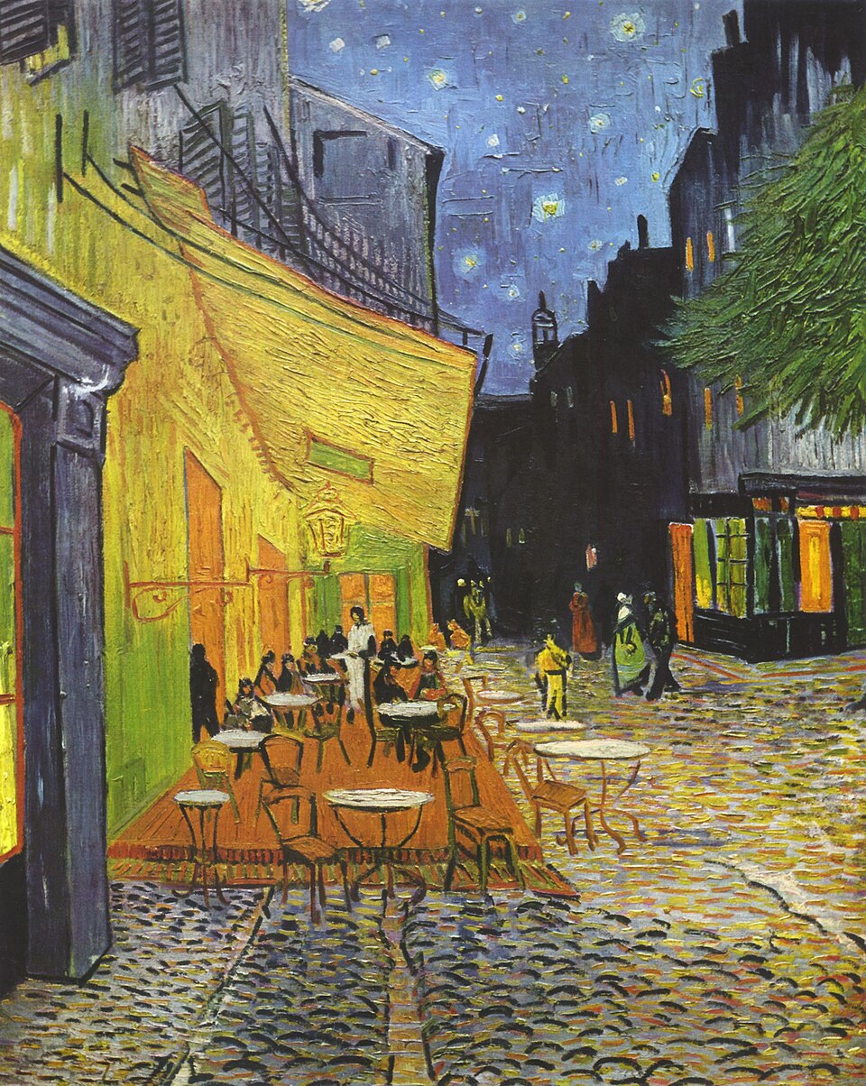 Van Gogh painting of yellow cafe terrace at night with cobblestone street and starry sky