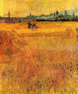 Van Gogh painting of golden wheat field with distant town of Arles and workers